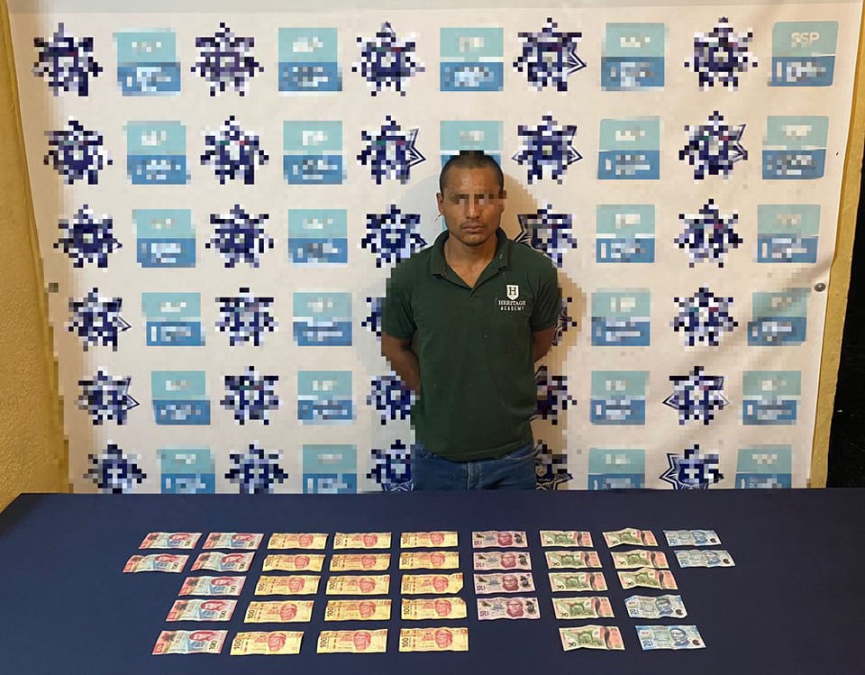 Cae ladrón de negocio con todo y botín